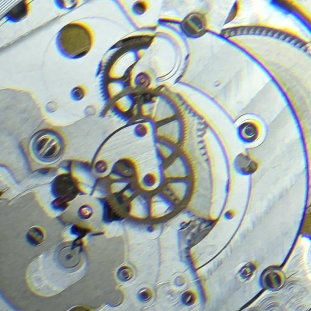 Extreme macro of a mechanical movement's gear train